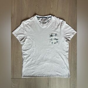 White T-shirt with fun front pocket! Size large!